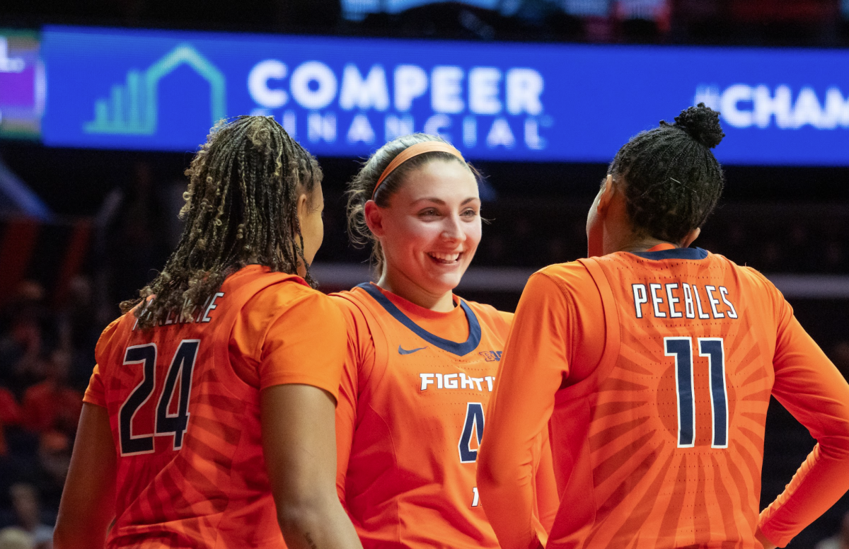 Fifth-year forward Kendall Bostic smiles with her teammates after a basket against Morehead State on Nov. 7, 2023. 