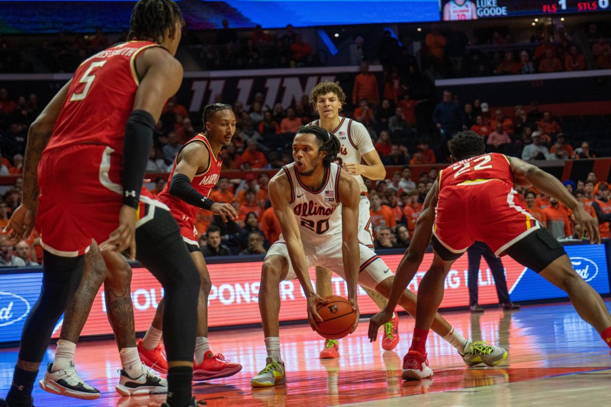 Junior guard Ty Rodgers infiltrates the Maryland zone defense and gets into the paint during a loss at State Farm Center on Jan. 14, 2024. 