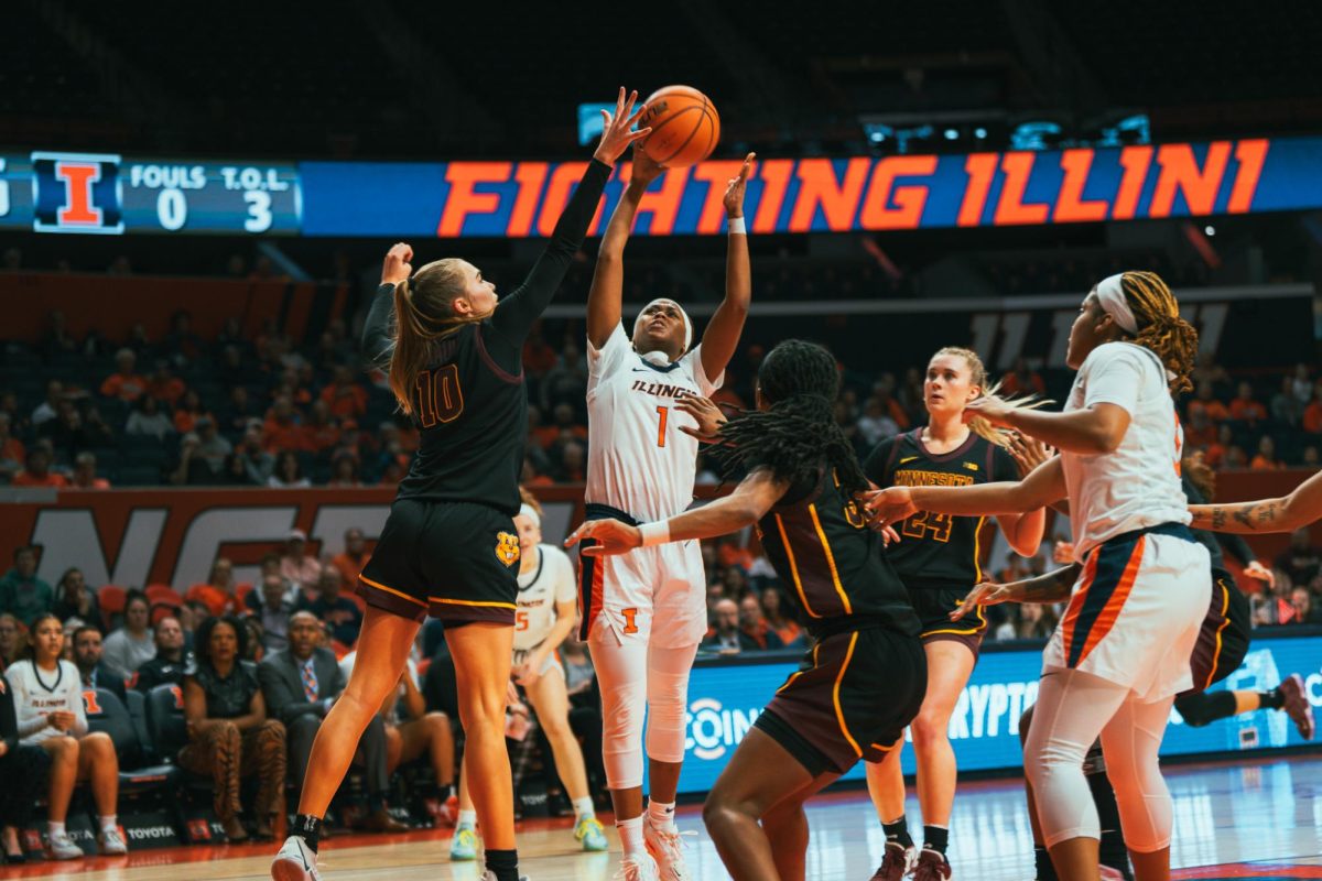 Fifth-year guard Genesis Bryant takes a contested shot against Minnesota on Jan. 28, 2024.