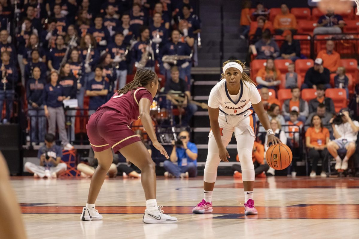 Fifth-year guard Genesis Bryant dribbles in front of a Florida State defender on Nov. 3, 2024.