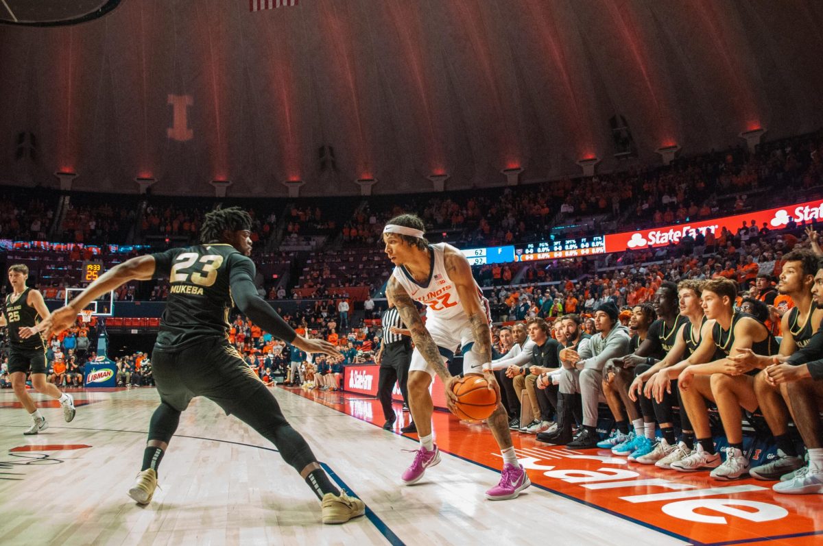 Junior guard Tre White looks to drive to the basket in a victory over Oakland on Nov. 13.