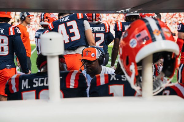 Defensive coordinator/secondary coach Aaron Henry talks to the team.