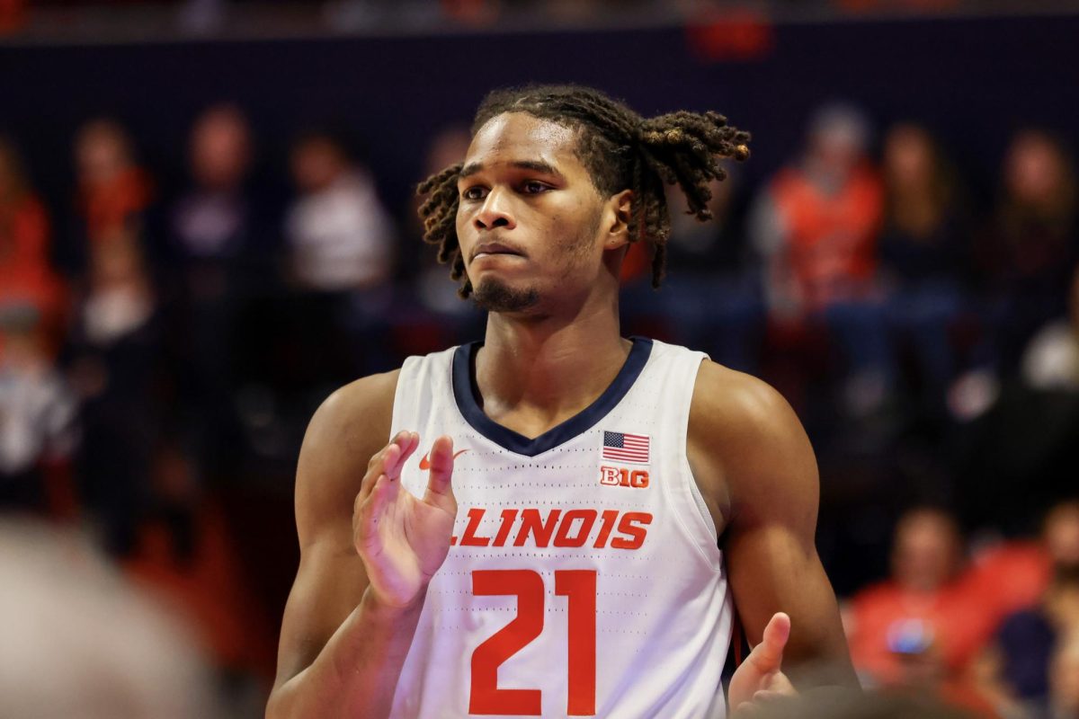 Freshman forward Morez Johnson Jr. claps as he checks into a Jan. 8 game against Penn State. Johnson scored a career high 20 points against the Nittany Lions.