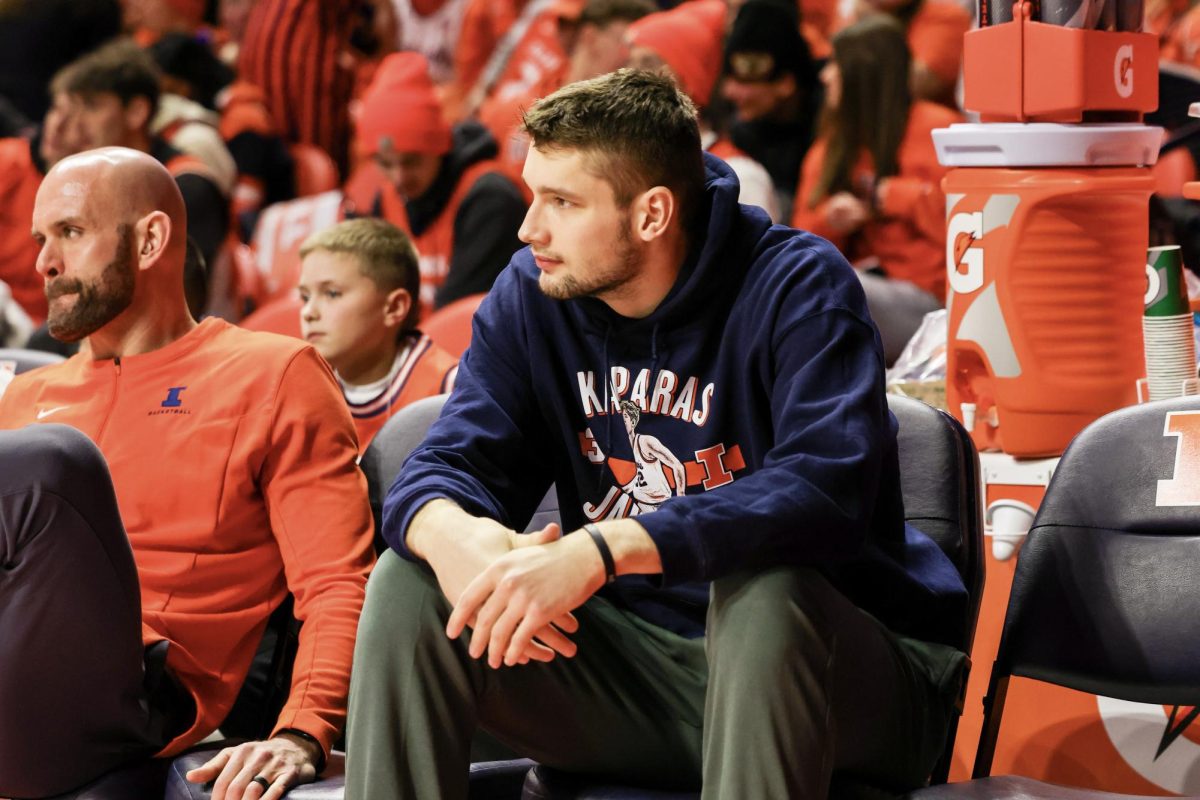 Sophomore center Tomislav Ivišić sits on the bench ahead of Illinois’ Jan. 23 matchup against Maryland.