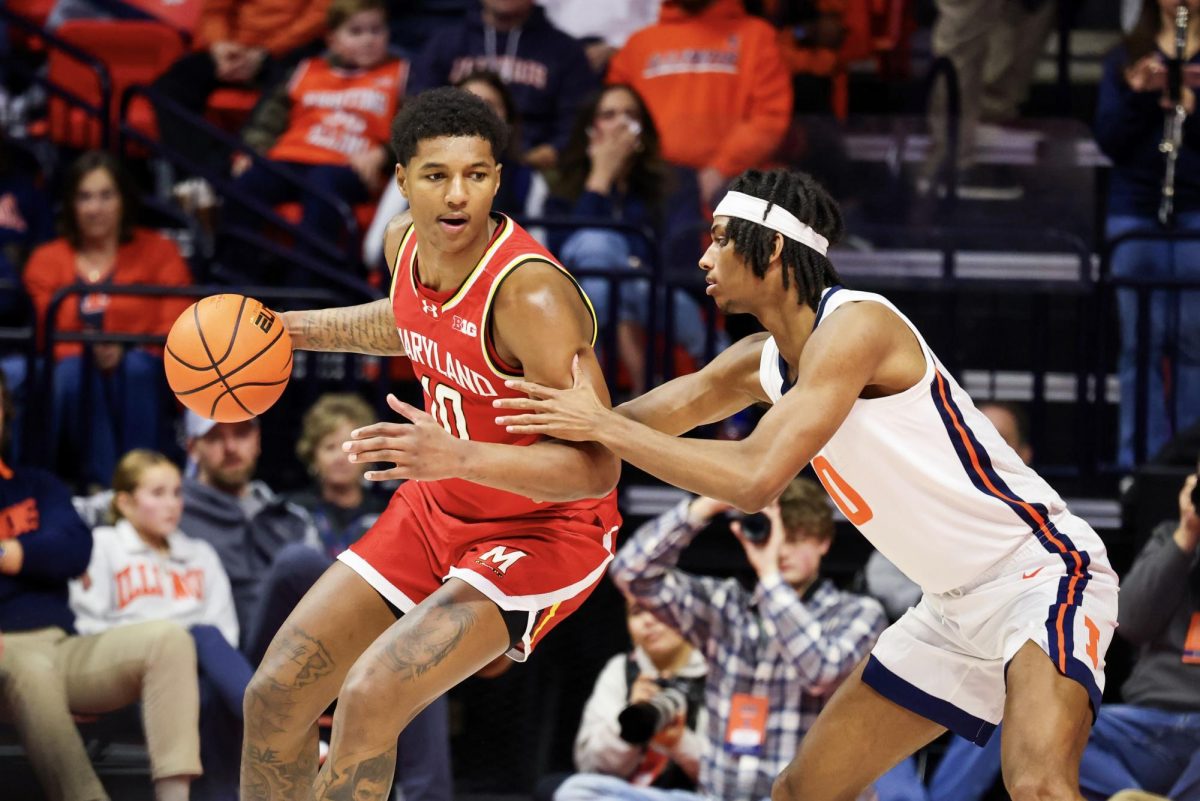 Maryland senior forward Julian Reese backs down Illinois sophomore forward Carey Booth on Jan. 23.