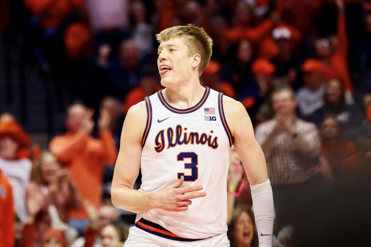 Graduate student forward Ben Humrichous celebrates after hitting a three-pointer on Jan. 26 against Northwestern. Humrichous shot 4-9 from three.