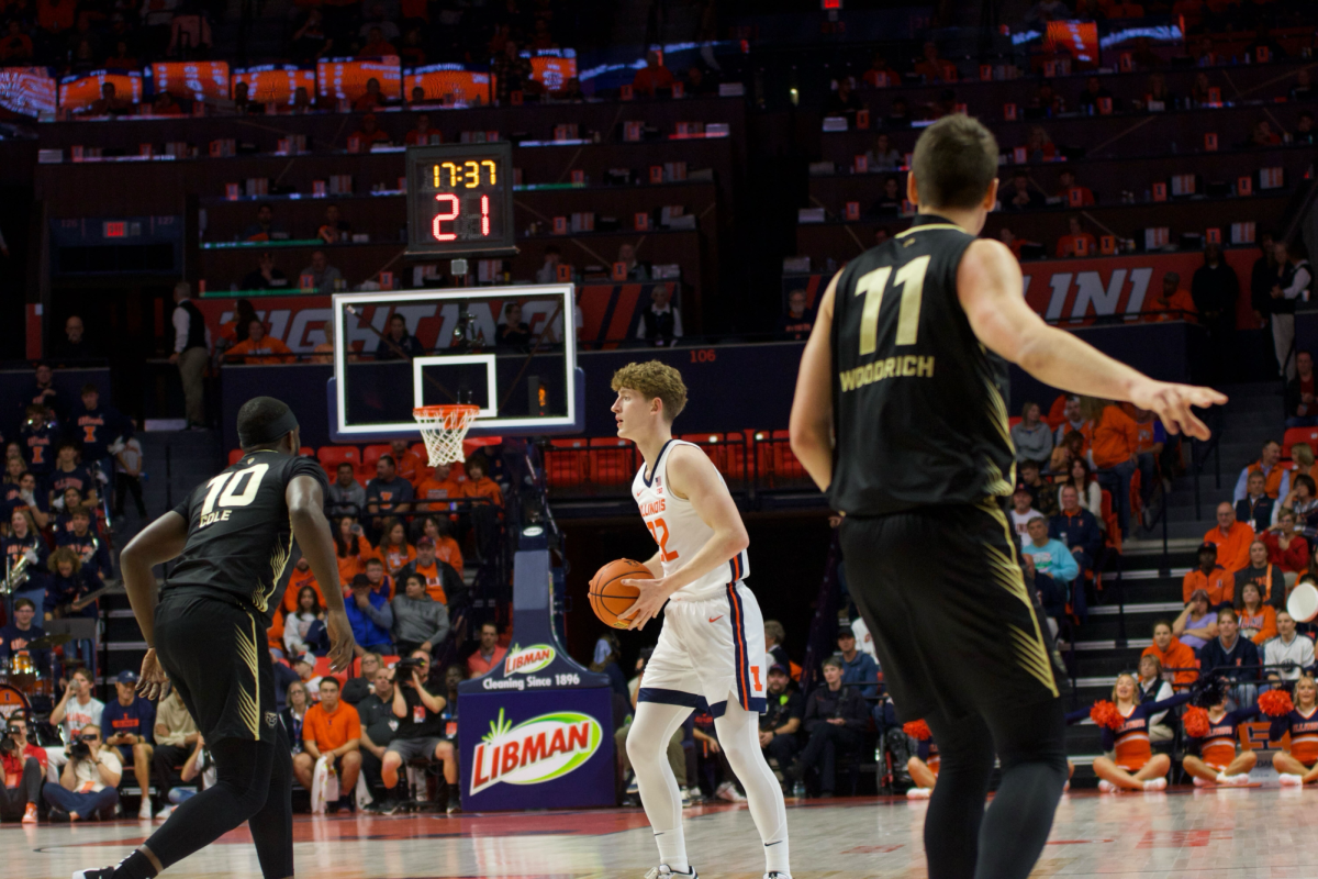 Freshman guard Kasparas Jakucionis waits for a screen against Oakland on Nov. 13.