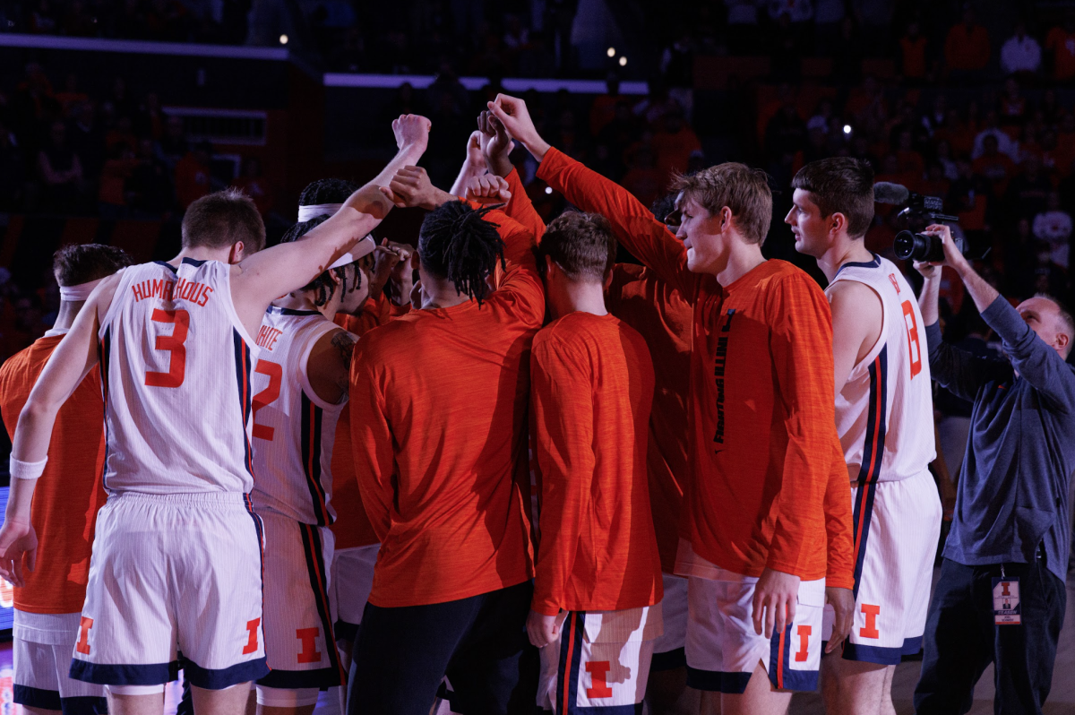 Illinois huddles up before a game against Penn State at State Farm Center on Jan. 8.