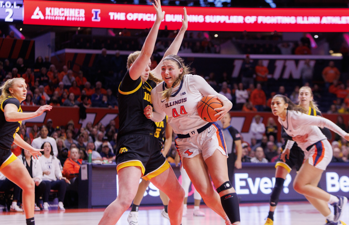 Fifth-year forward Kendall Bostic fights in the post on her way to an efficient 17 points in a win over No. 23 Iowa at State Farm Center on Jan. 9.