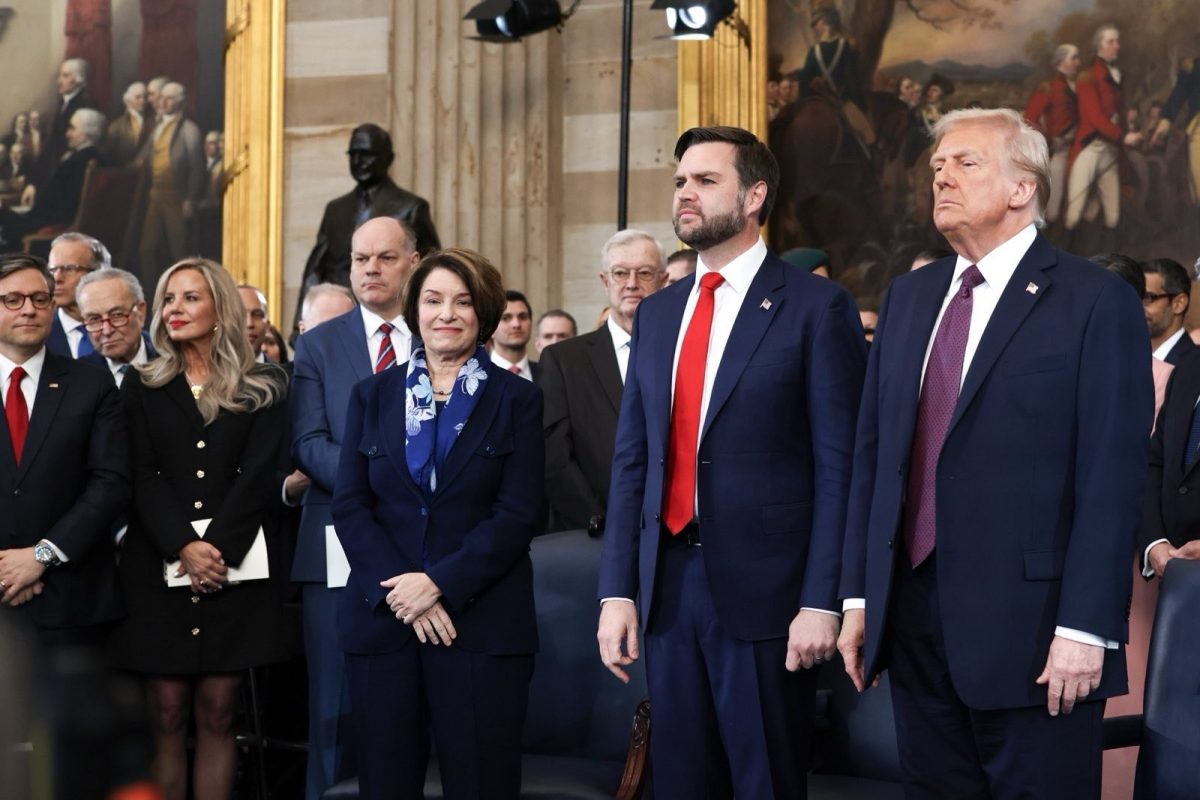 Donald Trump stands next to J.D. Vance during inauguration ceremonies in U.S. Capitol on Jan. 20, 2025.