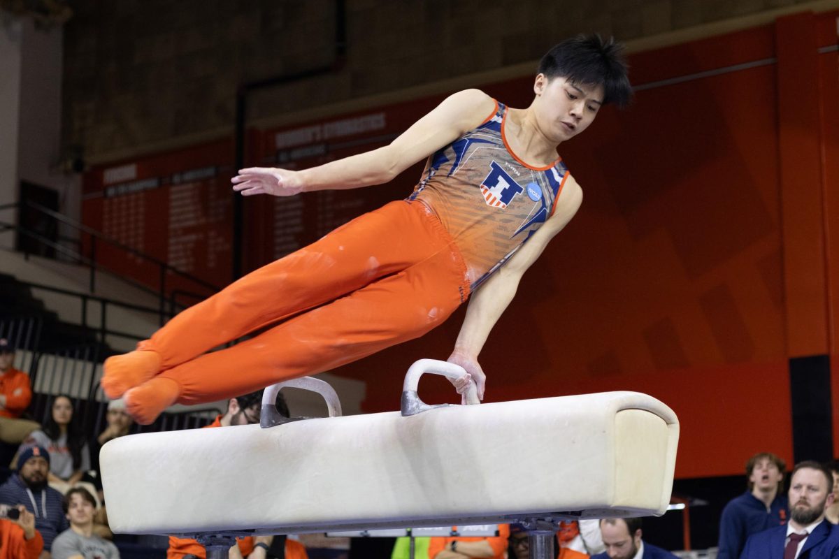 Sophomore Brandon Dang performs on the pommel horse against Nebraska on Jan. 31.