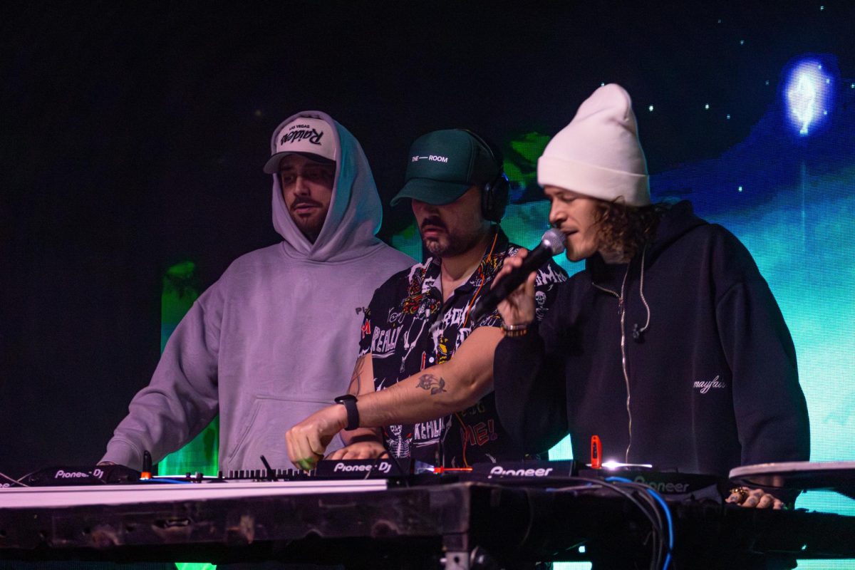 Cheat Codes performs at the Canopy Club in Urbana, on Feb. 9. The trio kept the energy high with a mix of live vocals and DJ sets.