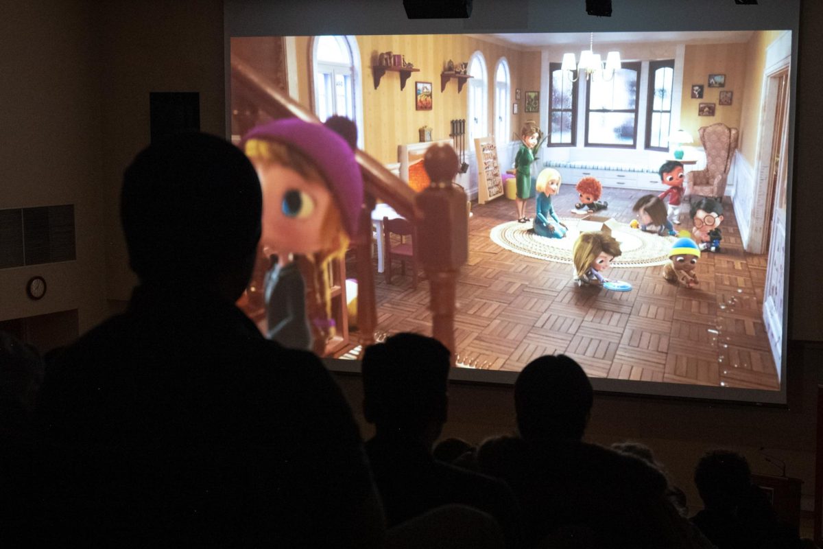 Audience members at the CU international film festival on Feb. 15 watch "Umbrella", a film by Helena Hilario and Mario Pece from Brazil.