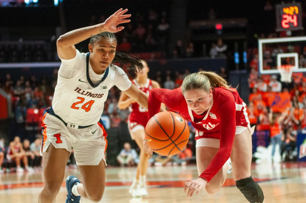 Senior guard Adalia McKenzie dives for a loose ball during a matchup against Nebraska on March 3, 2024.