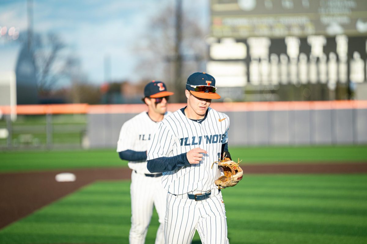 Illinois baseball jogs off Illinois Field after a 15-5 win over Northern Illinois on April 12, 2024.