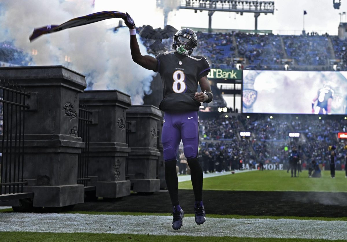 Ravens quarterback Lamar Jackson is introduced before game against the Eagles at M&T Bank Stadium on Dec. 1, 2024. (Kenneth K. Lam/Staff)
