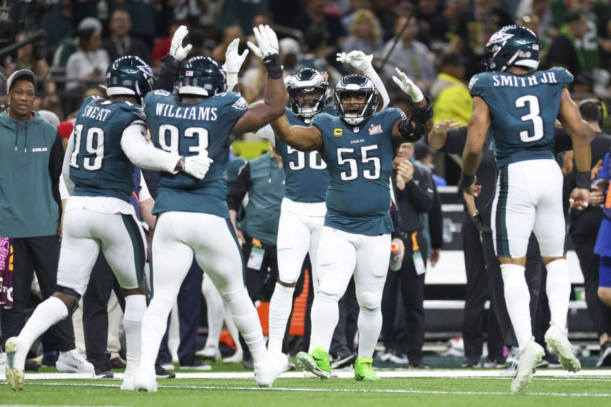 Eagles defensive end Brandon Graham (55) has been a mentor for several of the team’s youngsters, including linebacker Nolan Smith Jr. (3).