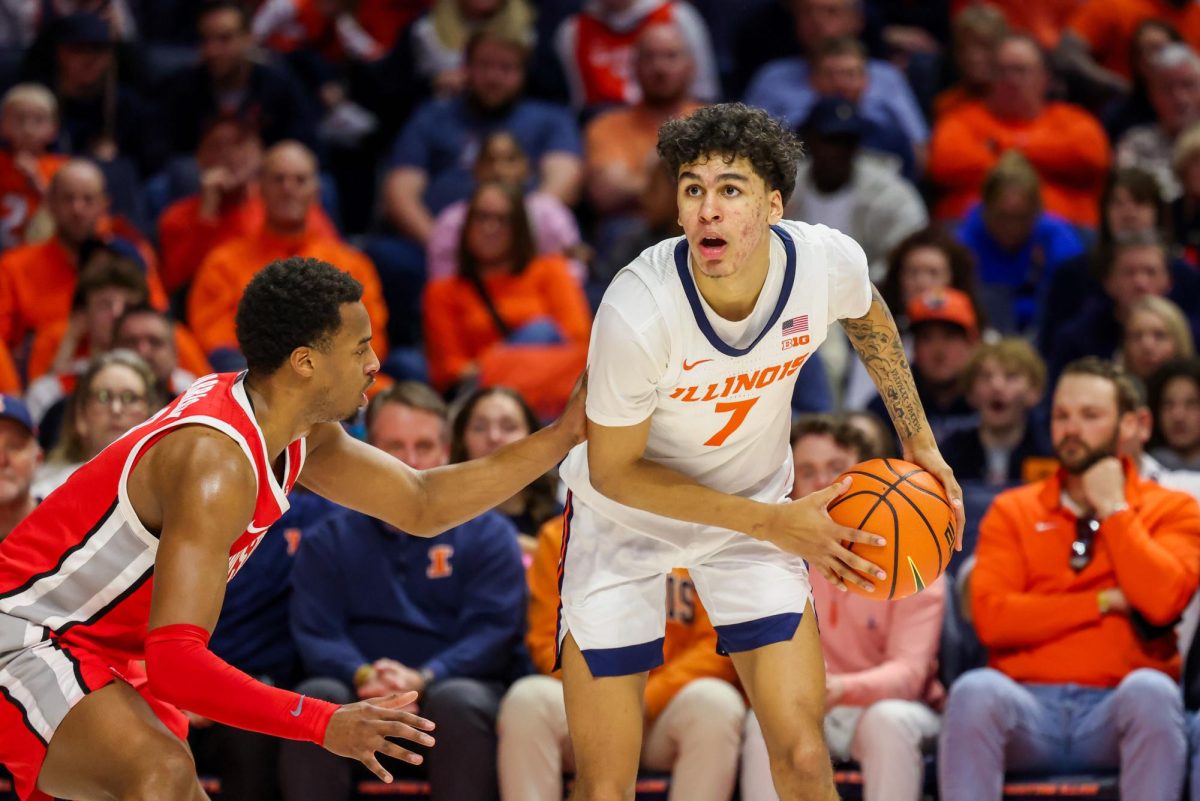 Freshman forward Will Riley waits for a screen on the wing during No. 18 Illinois' win over Ohio State on Feb. 2. Riley finished with a team-high 24 points.