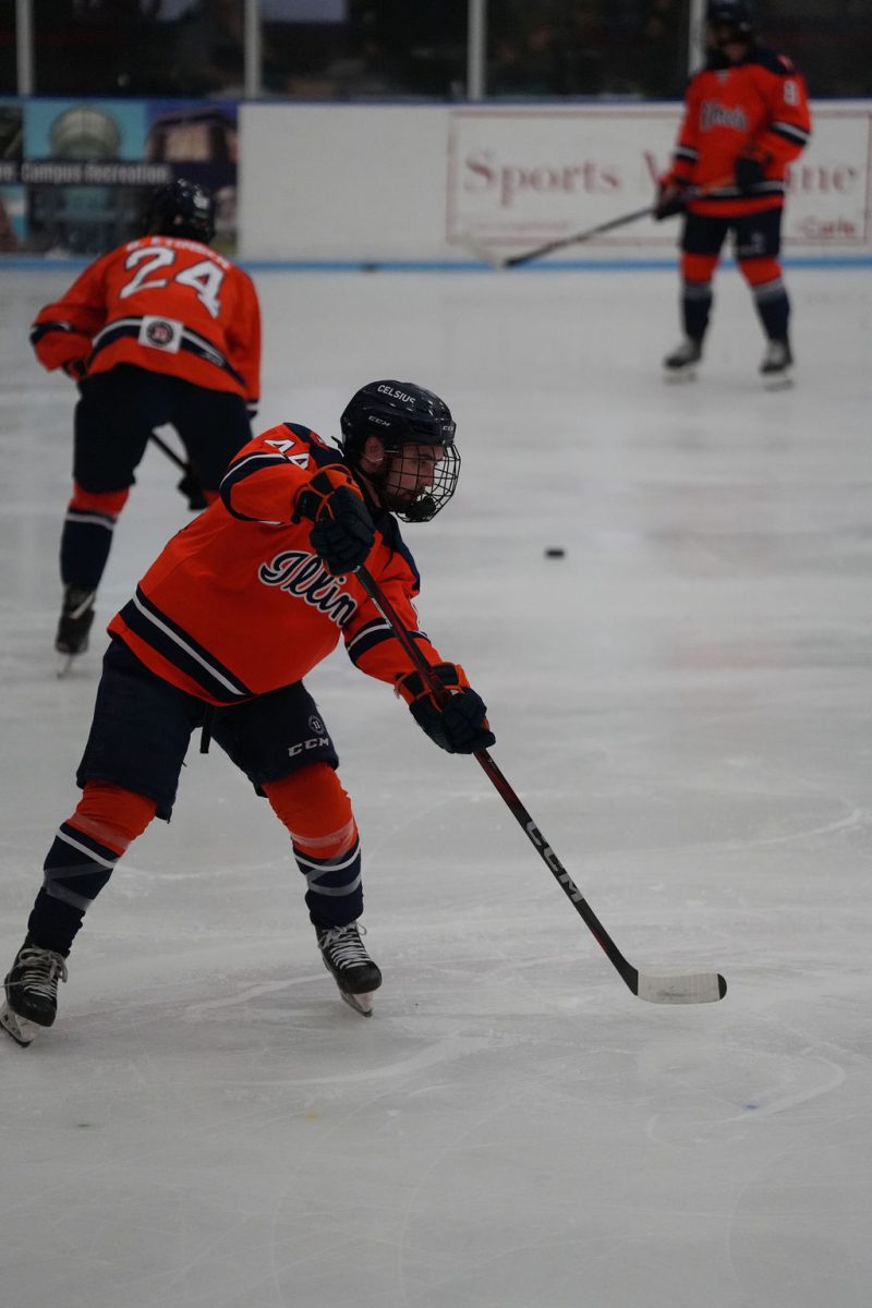 Junior defenseman Matthew McDonald warms up before a match against Michigan State on Sept. 20, 2024.