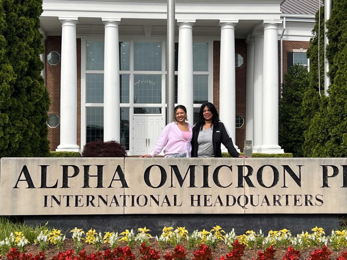 Bobra Crockett with daughter Joia Crockett in front of Alpha Omicron Pi.