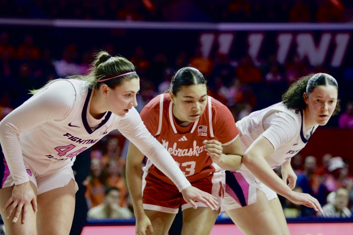 Fifth-year forward Kendall Bostic and freshman forward Berry Wallace box out during a free-throw attempt against Nebraska on Feb. 26, 2025. 