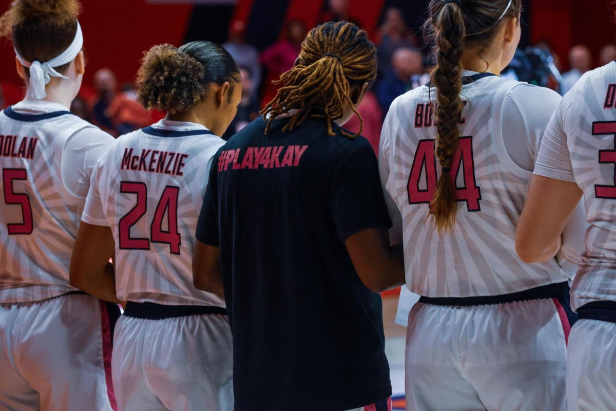 Illinois women’s basketball stands for the national anthem.