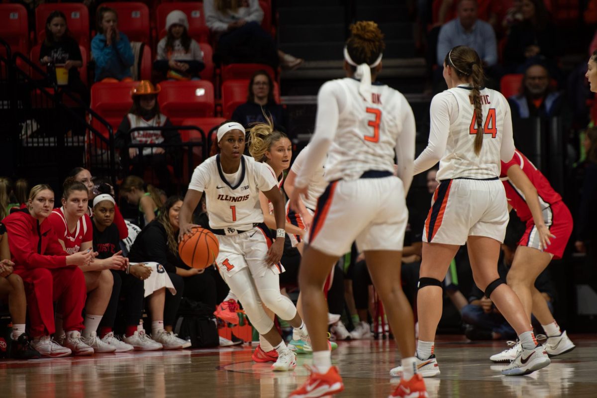 Fifth-year guard Genesis Bryant dribbles around the court during the game against Ohio State on Jan. 25, 2024.