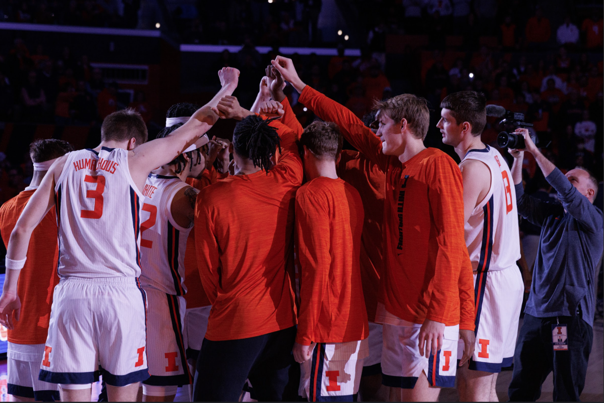 Illinois goes into a team huddle after pregame introductions on Jan. 9. 