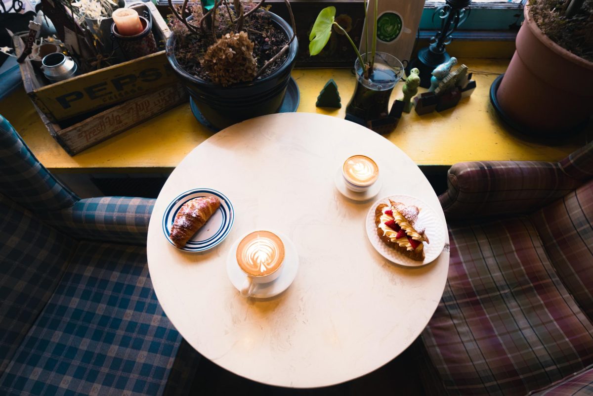 Two comfy seats located adjacent to the entrance offer a peaceful space for customers to enjoy their meal.