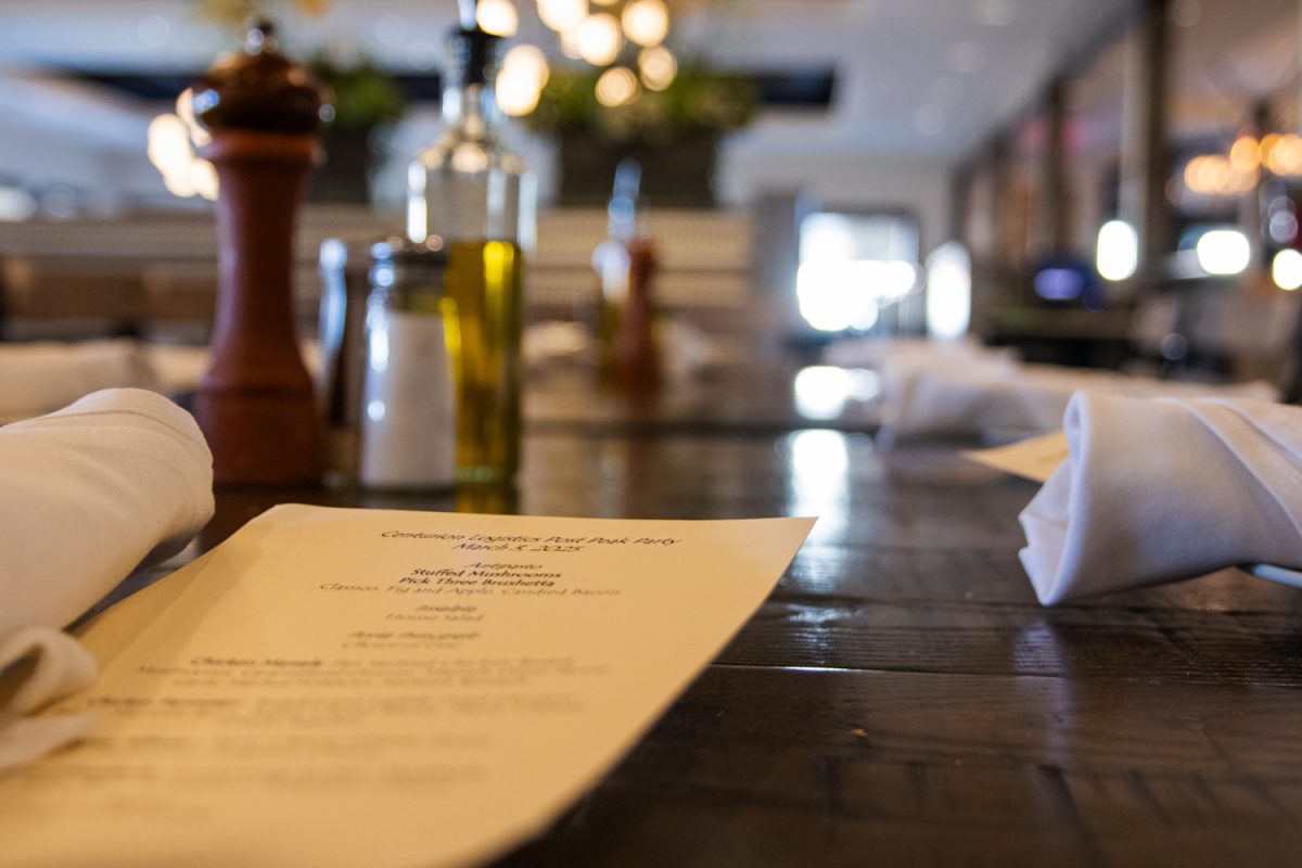 A set table and menu is prepared for a company dinner at Biaggi's Ristorante Italiano on March 3. Its menu features classic Italian dishes and desserts.