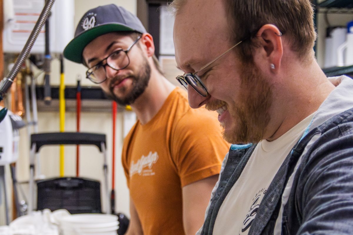 Good Judys owners Jeffery and Dakota Thomas-Wilhelm wash dishes together on March 21. The couple, originally from Iowa, opened the espresso and bagel bar in January 2024.