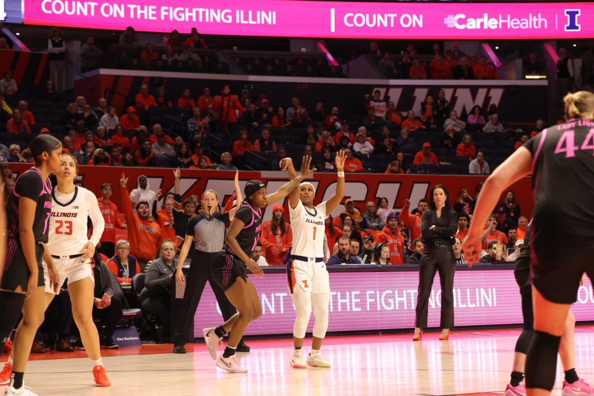 Fifth-year guard Genesis Bryant watches her three-point shot fall in the basket during the game against Penn State on Feb. 13. 