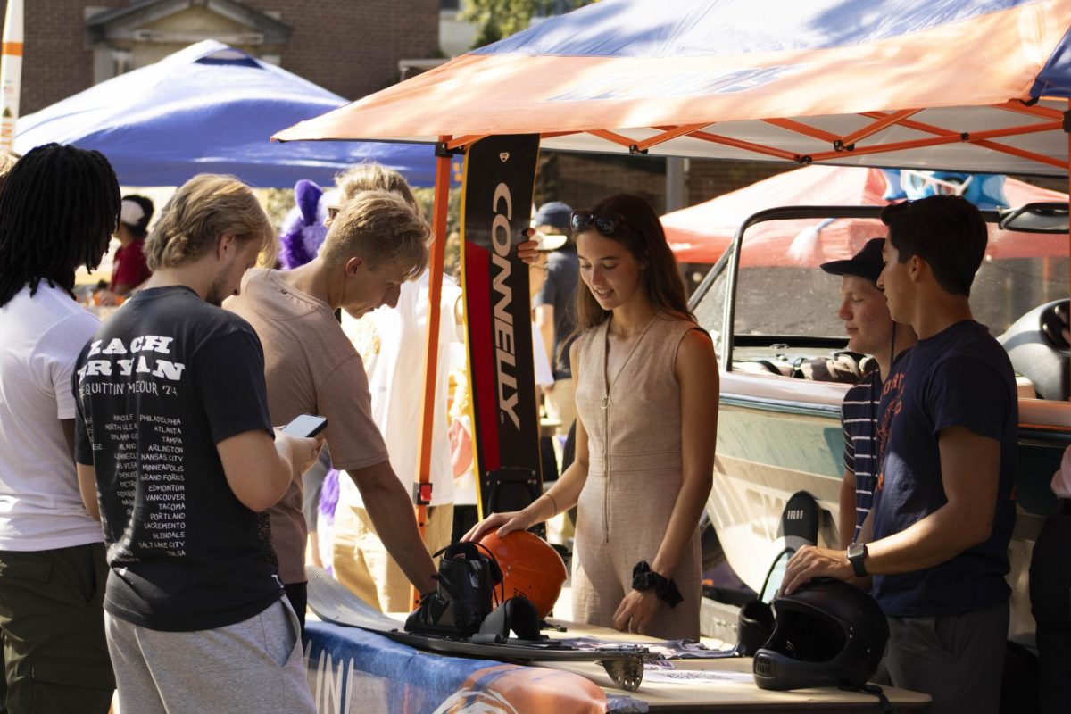 Students talk to members of Illini Waterski during Quad Day on Aug. 25.