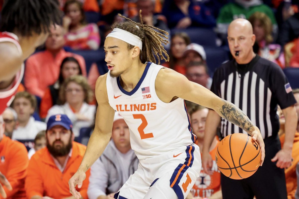 Sophomore guard Dra Gibbs-Lawhorn handles the ball against Wisconsin on Dec. 10, 2024.