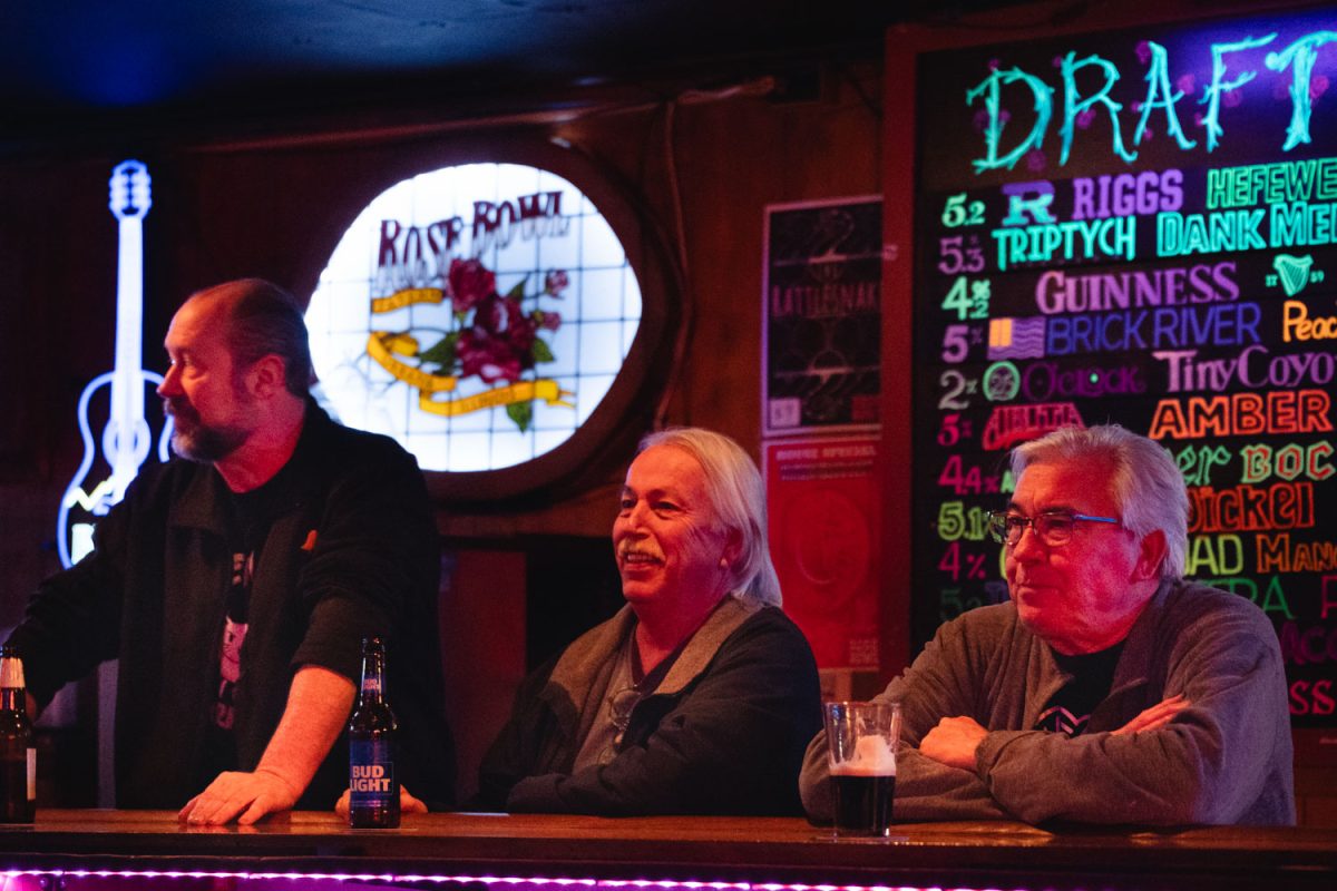 On the evening of Feb. 28, patrons sit at the bar of Rose Bowl Tavern during a quite evening enjoying their drinks and each others company.