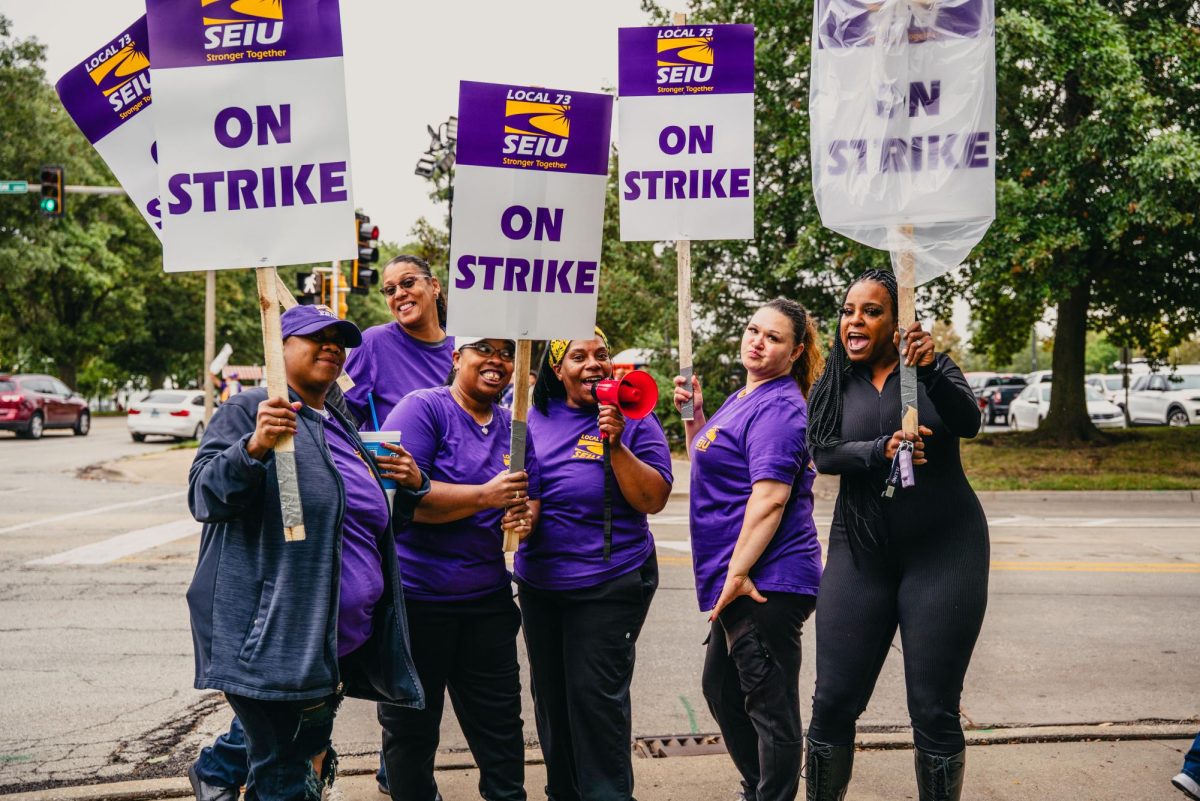 A group of SEIU Local 73 members hold signs during a strike in 2022 due to contract negotiations.