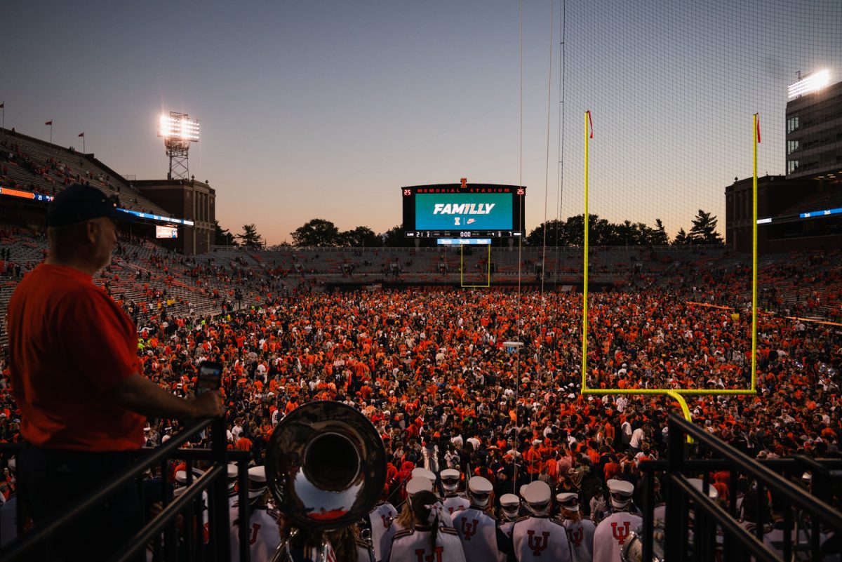Illini fans swarm the field of Memorial Stadium on Oct. 19 after Illinois football defeated Michigan.