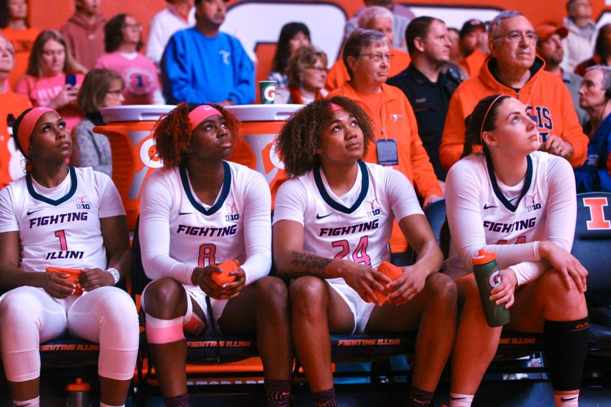 From left to right: Fifth-year guard Genesis Bryant, sophomore guard Jasmine Brown-Hagger, senior guard Adalia McKenzie and fifth-year forward Kendall Bostic watch the pregame video before their game against Nebraska on Feb. 16. 