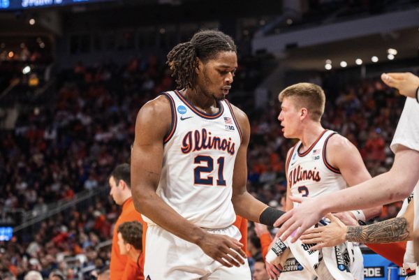Freshman forward Morez Johnson Jr. heads to the bench on Mar. 21 against Xavier in the first round of the 2025 NCAA tournament in Milwaukee.