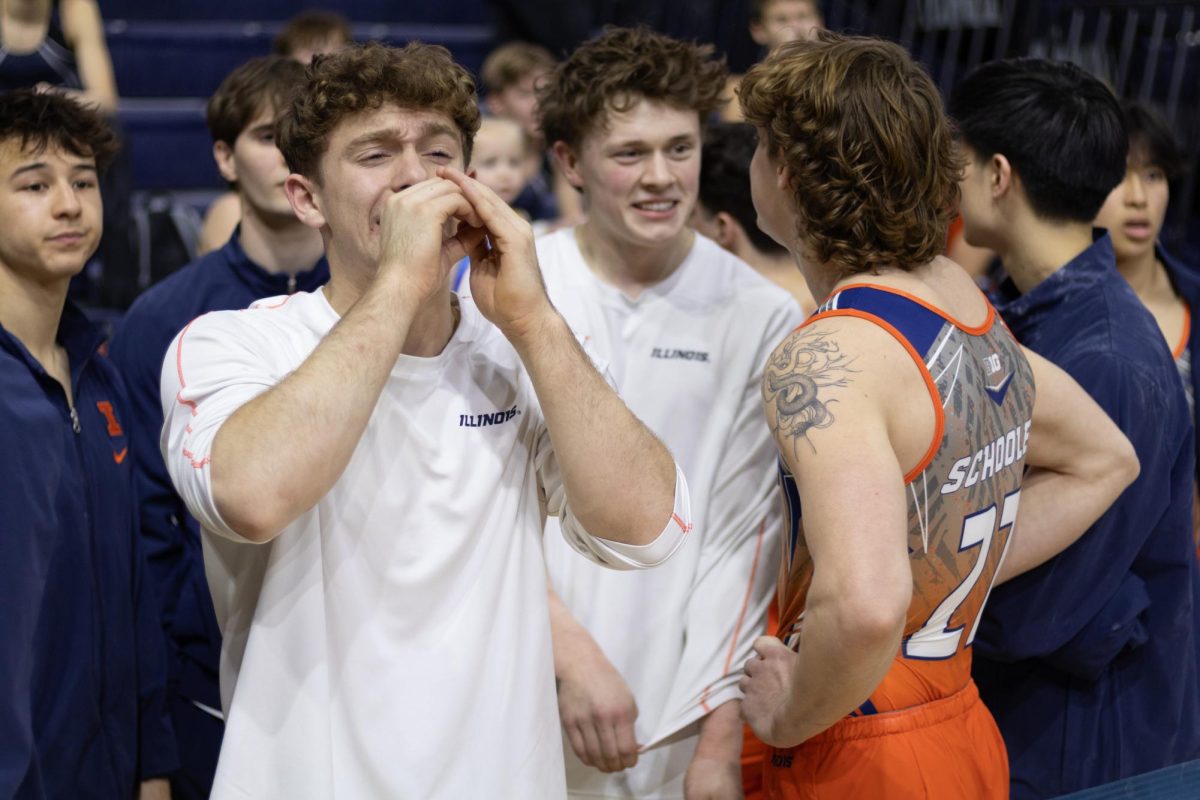 Junior Tate Costa and sophomore Garrett Schooley at the meet against Nebraska on Jan 31.