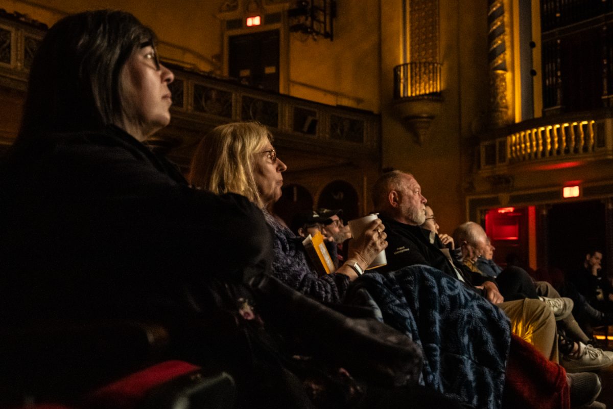 Audience memebrs watch the film “Touch” during Ebertfest at the Virginia Theatre in Champaign on April 26.