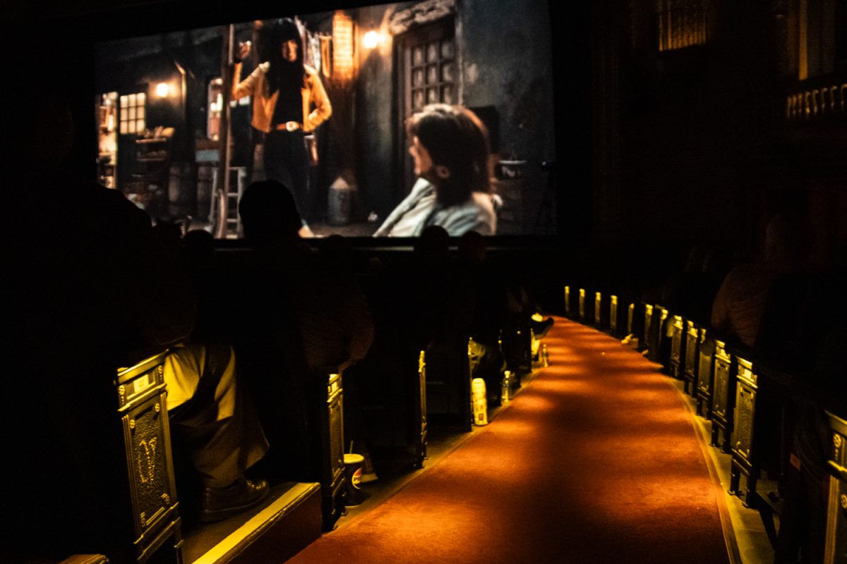 Audience memebrs watch the film “Touch” during Ebertfest at the Virginia Theater in Champaign on April 26.