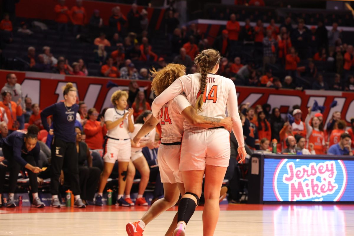 Senior guard Adalia McKenzie and fifth-year forward Kendall Bostic celebrate during the game against Penn State on Feb. 13.