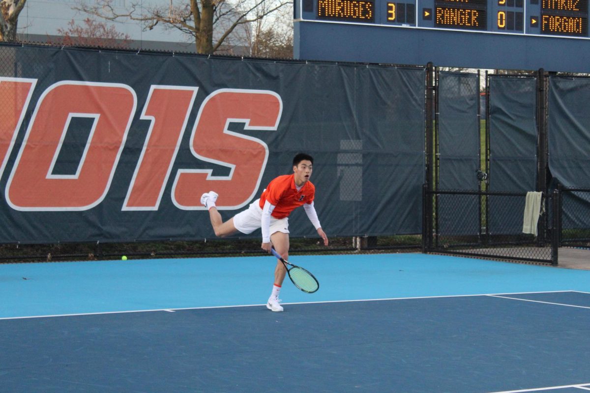 Junior Kenta Miyoshi strikes the ball during his solo match against Penn State on April 12.