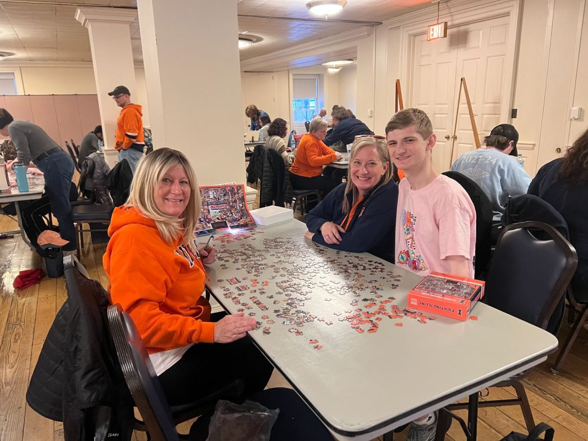 Moms and students puzzling at the Illini Union on Saturday. 