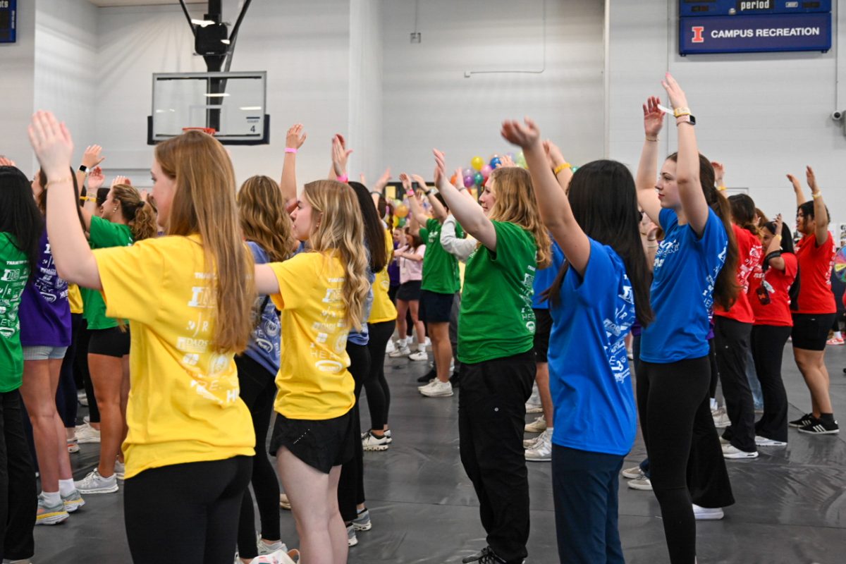 Participants join in the opening dance for Illinithon's 10-hour dance marathon on April 11. Illinithon raises funds for St. John's Children's Hospital at various events throughout the year.