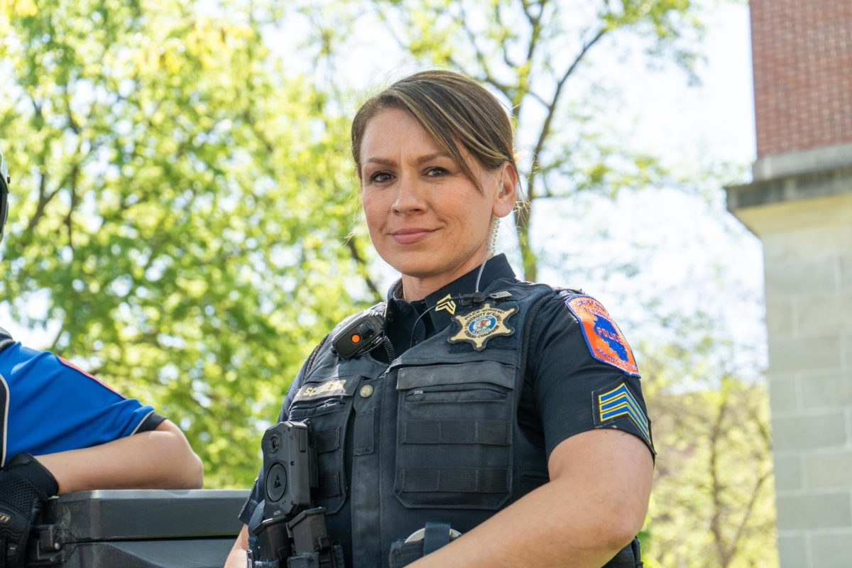 UIPD officer Schroeder stands watch to ensure student safety during Spring Jam 2025, April 27.