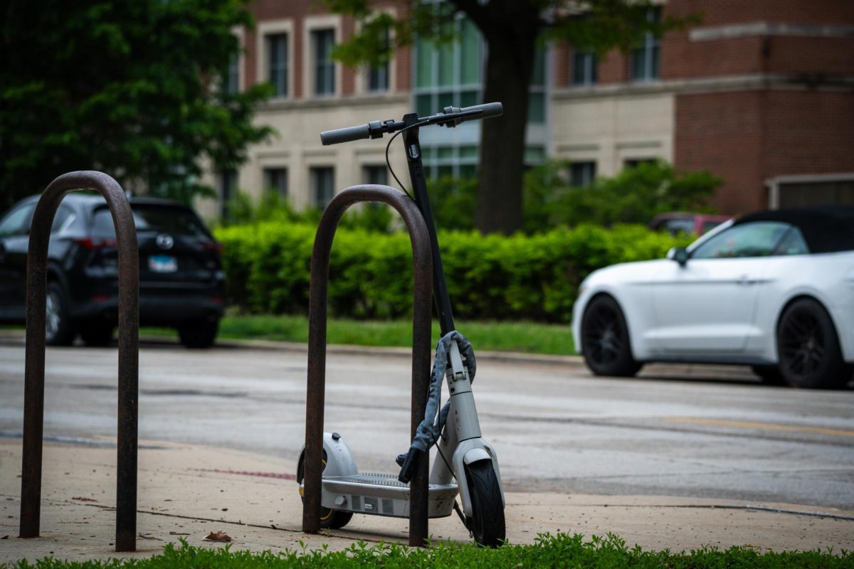 An electric scooter sits outside the Activities and Recreation Center on East Peabody Drive on May 4.
