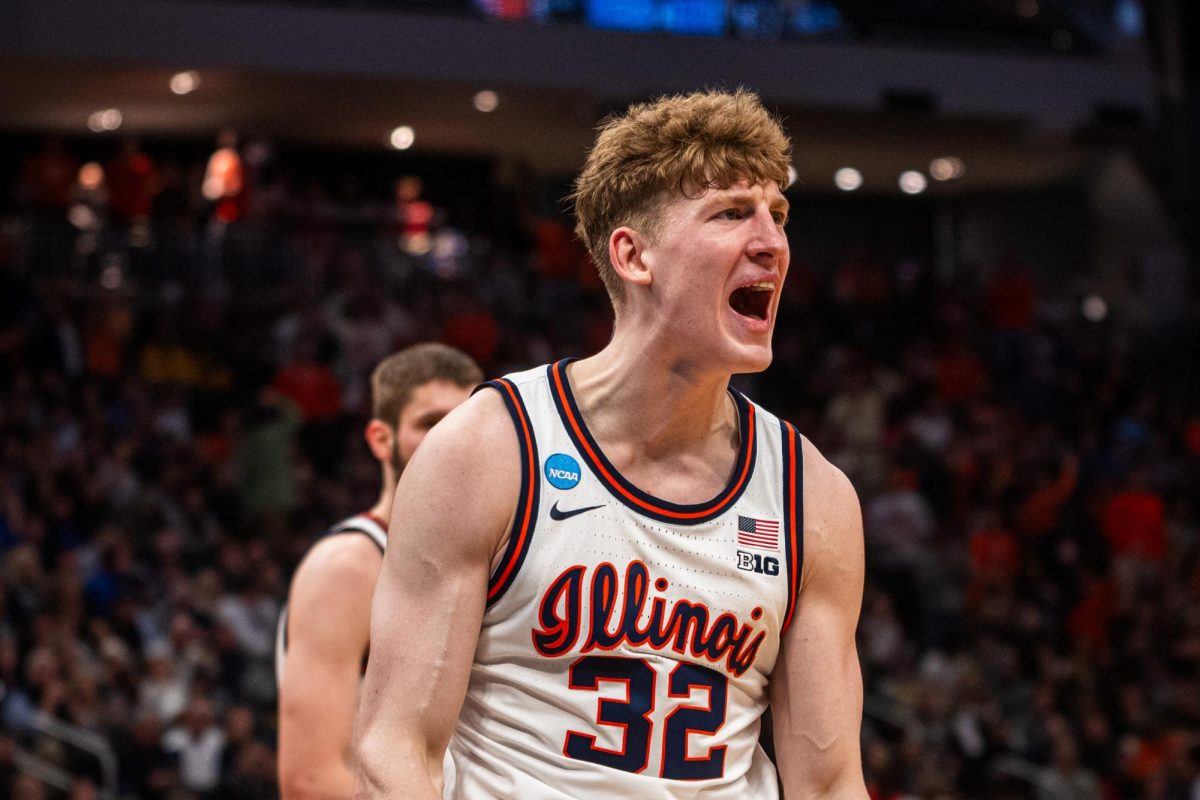 Kasparas Jakučionis celebrates during Illinois' first round 2024 NCAA tournament win on March 21 over Xavier.