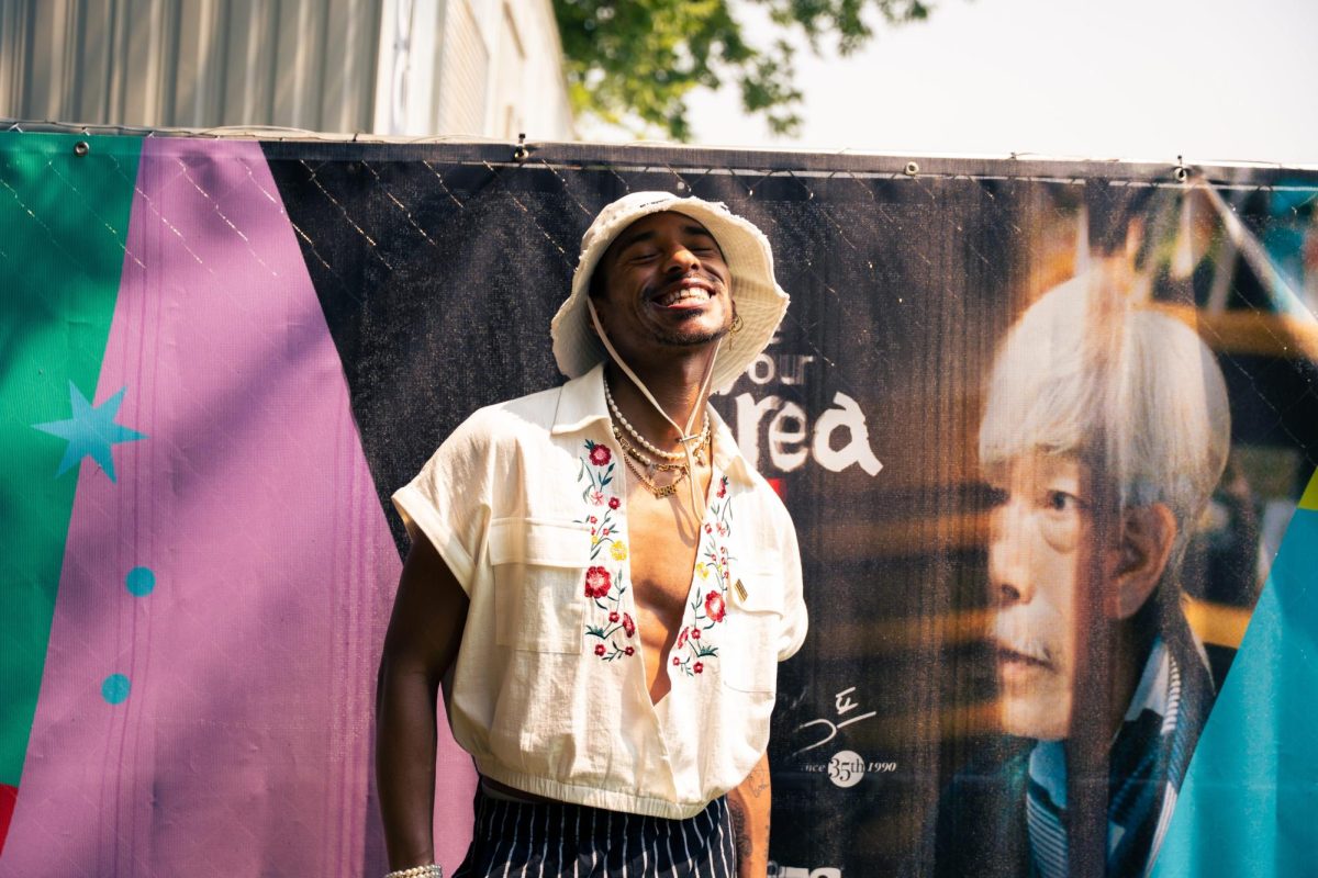 GRAMMY-nominated singer and songwriter Durand Bernarr beams before his set on the T-Mobile stage on the first day of Lollapalooza, July 31.